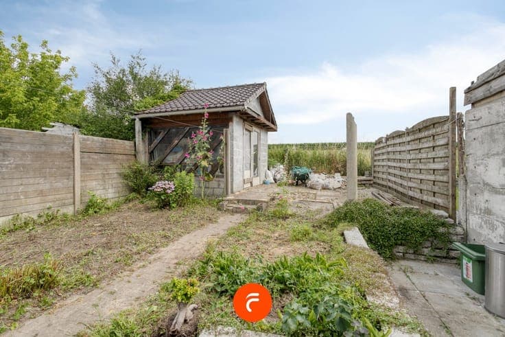 Verder af te werken woning met tuin op 171 m2