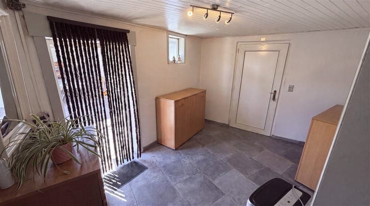 CENTRALLY LOCATED HOUSE WITH SPACIOUS POSSIBILITIES NEAR THE