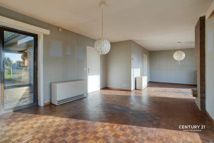A villa in need of some updating with a stunning rural view!