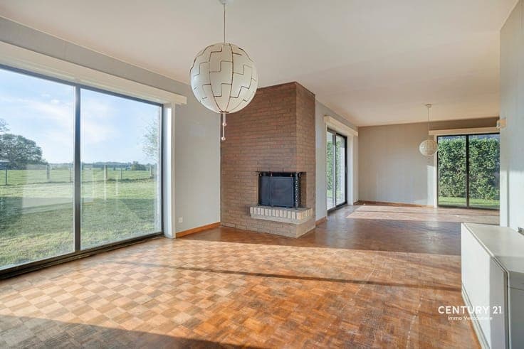 A villa in need of some updating with a stunning rural view!