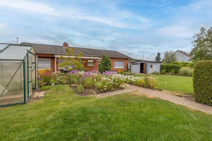 Verzorgde woning met 3slpk, inpandige garage en tuin