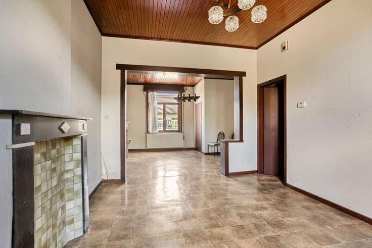 Open-concept home with 5 bedrooms, a garage, and a spacious