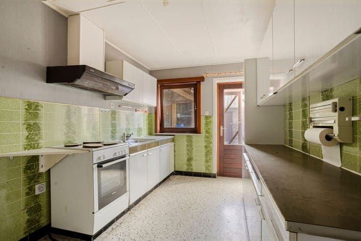 Open-concept home with 5 bedrooms, a garage, and a spacious