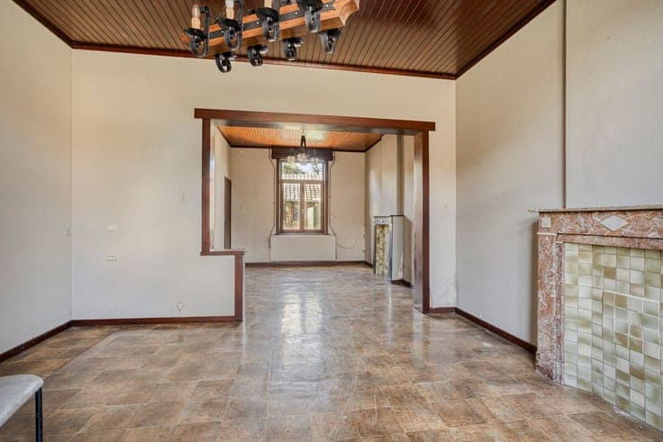 Open-concept home with 5 bedrooms, a garage, and a spacious