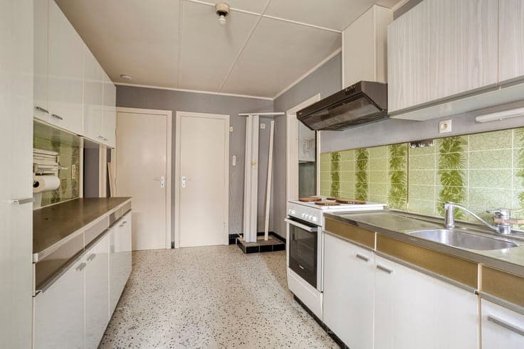 Open-concept home with 5 bedrooms, a garage, and a spacious