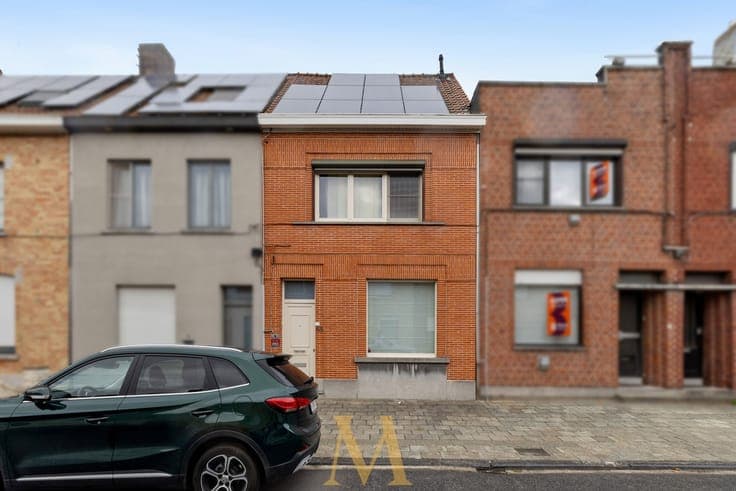 Ruime gezinswoning met zonnige tuin en garage in centrum ...