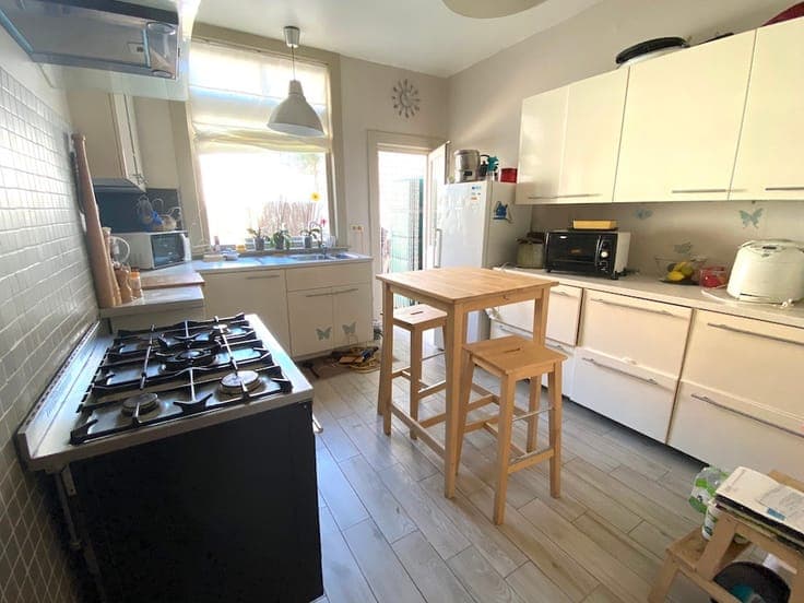 ZWANKENDAMME: RUIME, TE MODERNISEREN WONING MET ZONNIG TE...