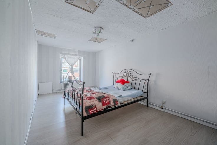 Building with 2 duplexes and a garden in Onhaye