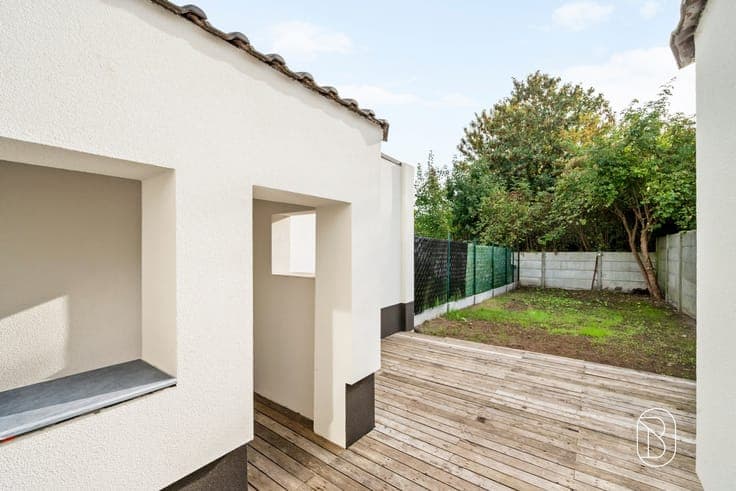 A move-in-ready, energy-efficient 4-bedroom home with a gard