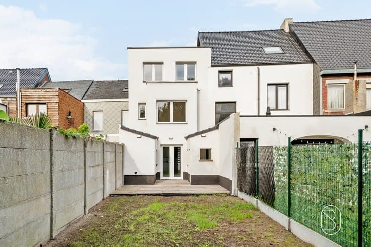 A move-in-ready, energy-efficient 4-bedroom home with a gard