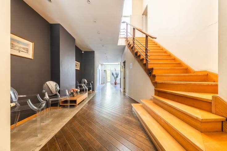 A charming mixed-use building comprising 3 units and garden