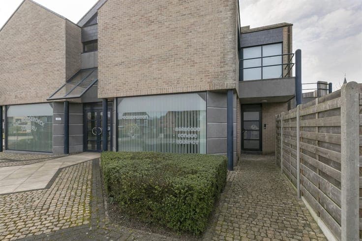 Revenue property consisting of commercial store and 2 apartm