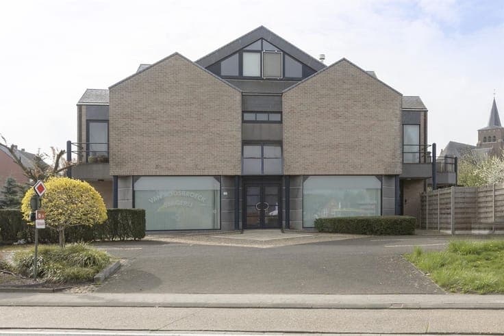 Revenue property consisting of commercial store and 2 apartm