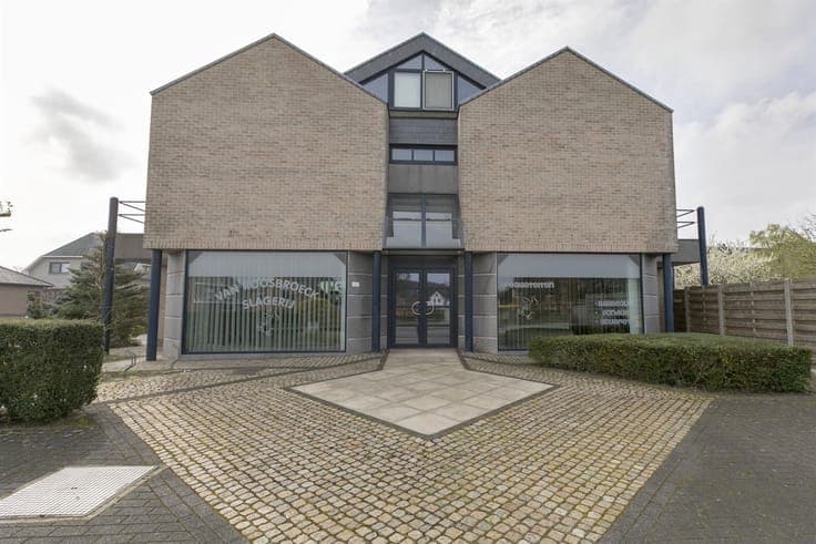 Revenue property consisting of commercial store and 2 apartm