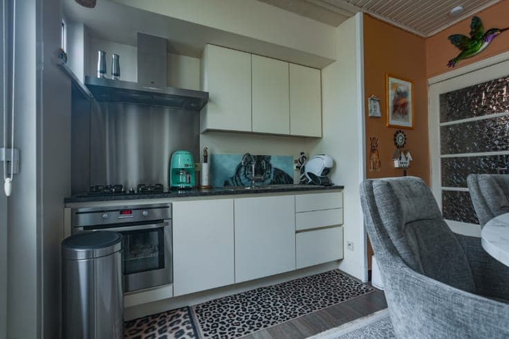 Rustig gelegen woning met 3 slaapkamers en tuinterras op ...