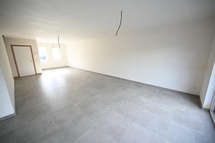 AFGEWERKTE nieuwbouwwoning met GARAGE en RUIME TUIN (opp....