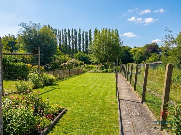 Belle maison 4 CH avec garage & beau jardin
