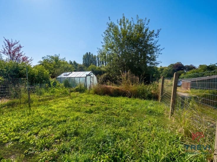 Belle maison 4 CH avec garage & beau jardin