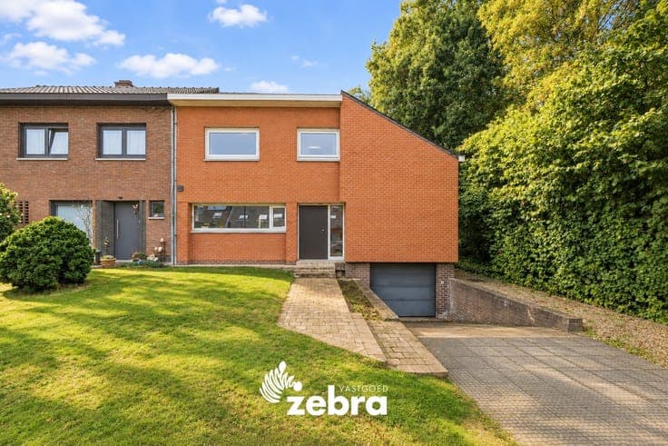 Ruime halfopen woning met 4 slaapkamers en westgerichte t...