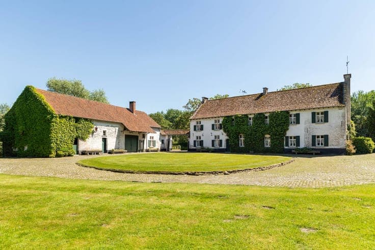 Historic castle farm and moated castle for sale in Grimberge