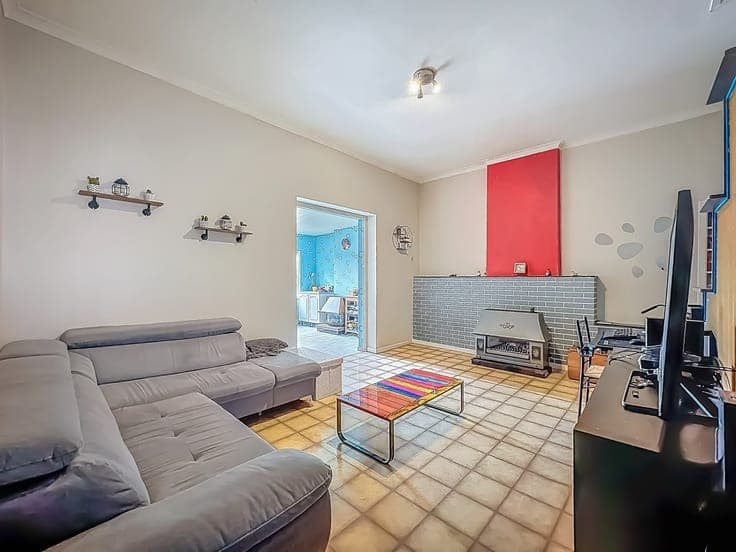 BONNE MAISON AVEC GARAGE ET JARDIN