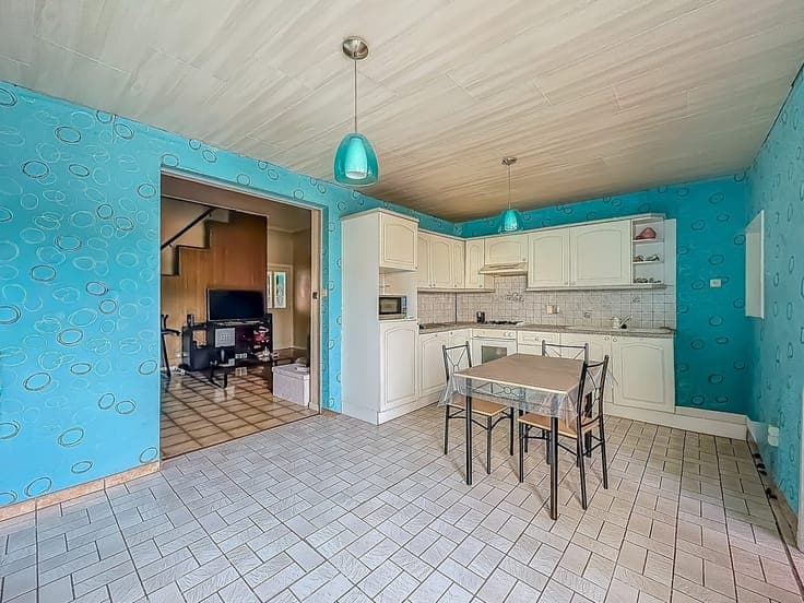 BONNE MAISON AVEC GARAGE ET JARDIN
