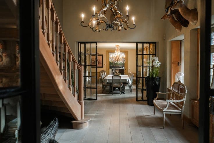 EXCEPTIONAL square farmhouse with numerous possibilities!