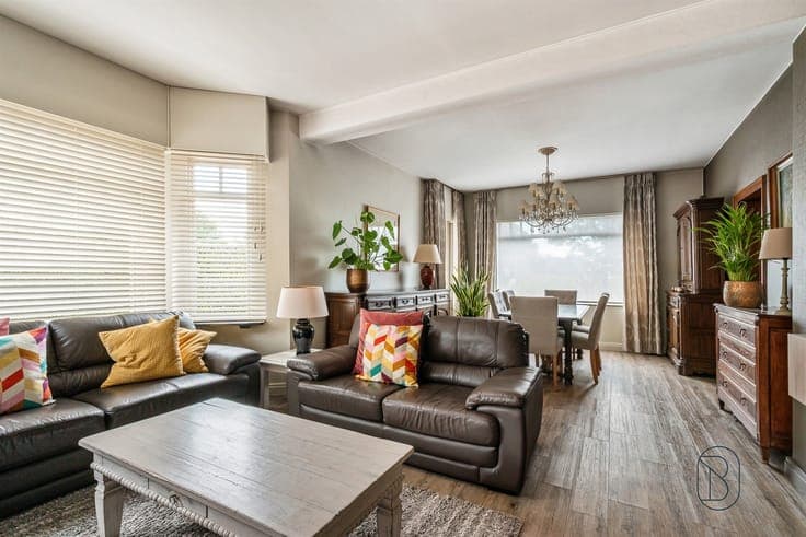 Well-maintained semi-detached home with a cozy garden and ca