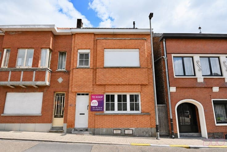 Charmante rijwoning met stadstuin, centraal gelegen in La...