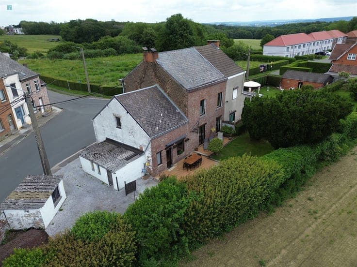 Maison 4 chambres avec jardin clôturé et garage