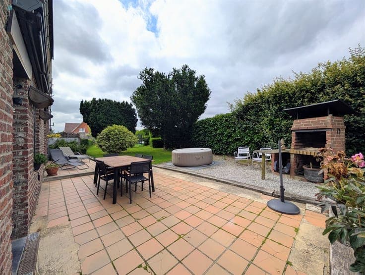 Maison 4 chambres avec jardin clôturé et garage