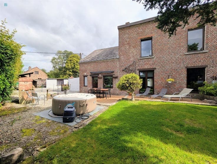 Maison 4 chambres avec jardin clôturé et garage