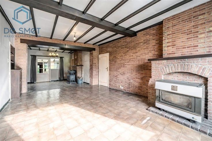 Renovation project with 5 bedrooms, garage, and spacious gar