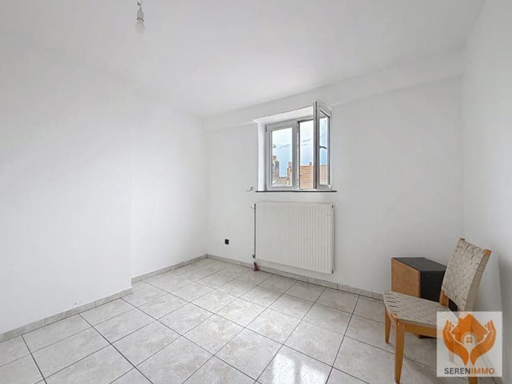 Single-Family House Converted into 4 Apartments