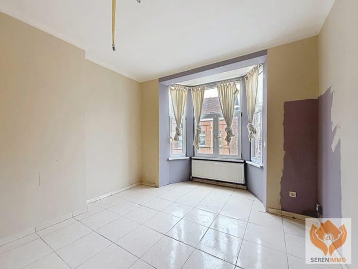 Single-Family House Converted into 4 Apartments