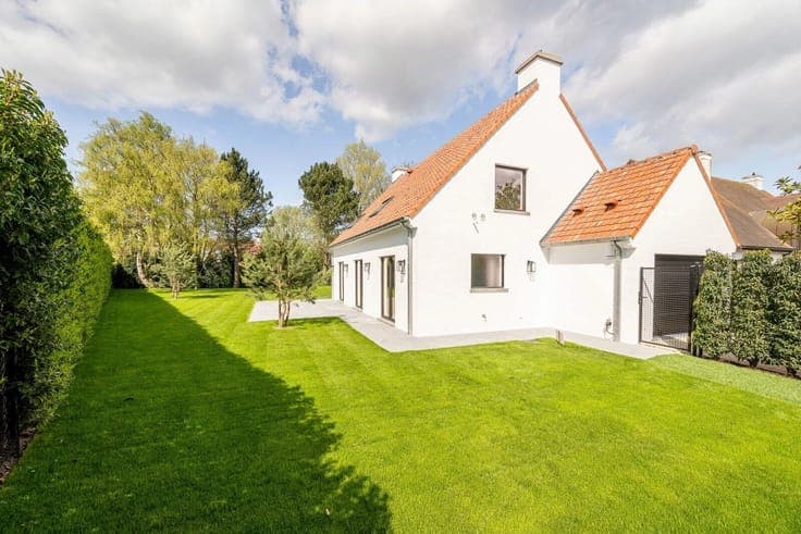 Elegantly renovated villa with bright living spaces and beau