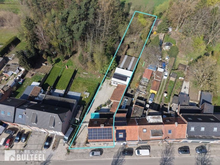 Energiezuinige woning met magazijn en grote tuin!