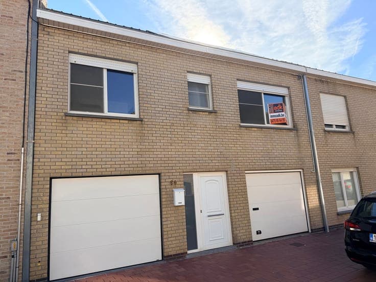 Move-in ready split-level home with terrace and spacious gar