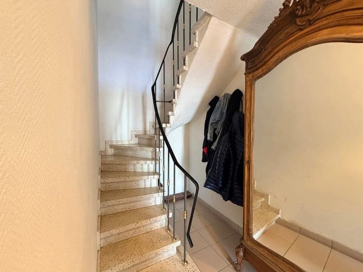 Move-in ready split-level home with terrace and spacious gar