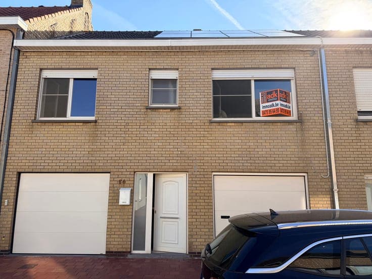 Move-in ready split-level home with terrace and spacious gar