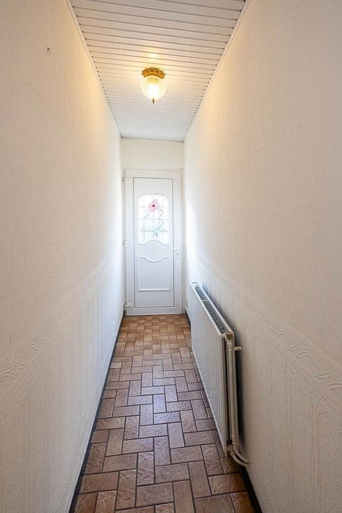 Te renoveren, charmante eengezinswoning met 2 slaapkamers en