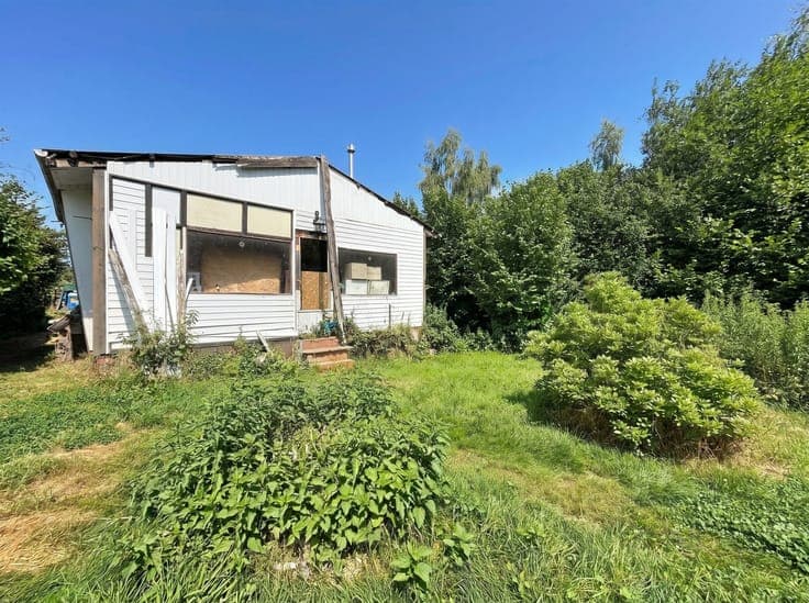 Chalet sur un terrain de plus de 23 ares