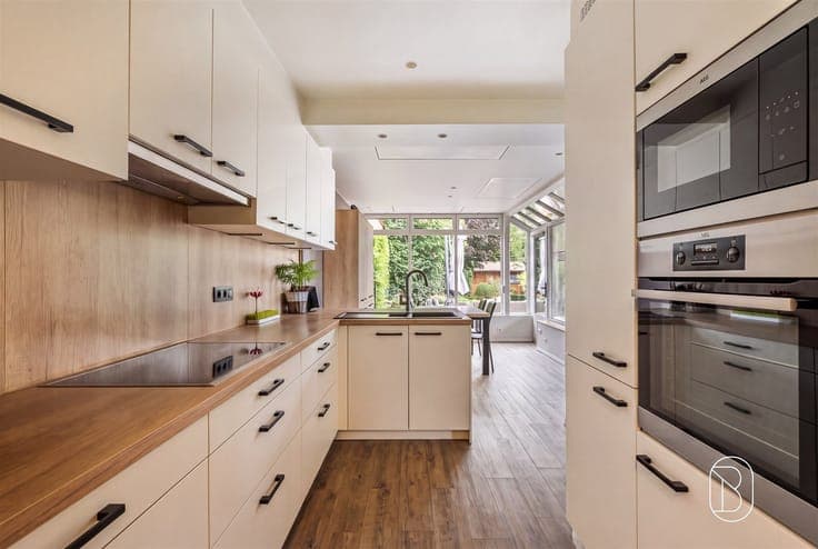 Well-maintained semi-detached home with a cozy garden and ca