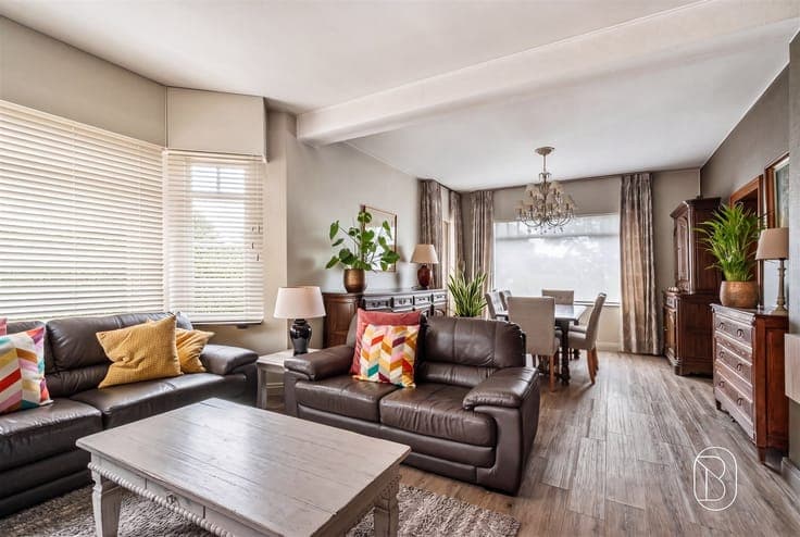 Well-maintained semi-detached home with a cozy garden and ca