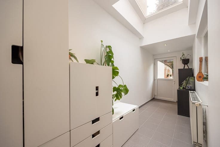 Stadswoning met privatieve tuin & garage
