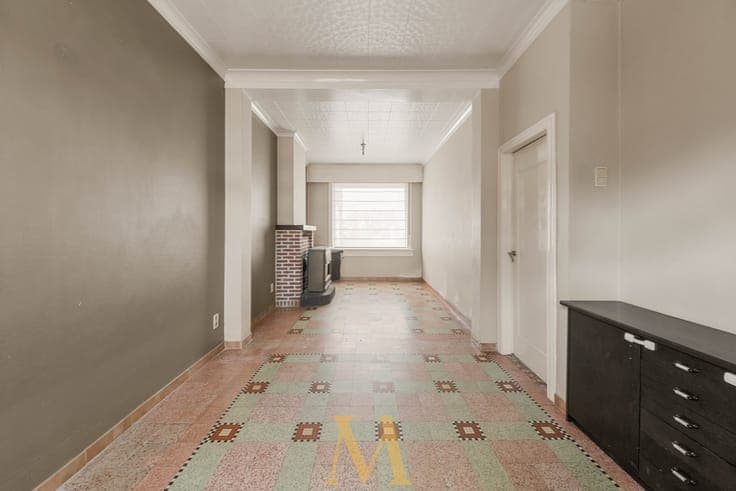 Ruime woning met 4 slaapkamers en garage op wandelafstand...