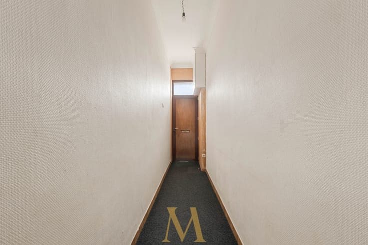 Ruime woning met 4 slaapkamers en garage op wandelafstand...