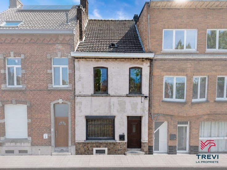 Maison à rénover offrant de beaux volumes et un fort potenti