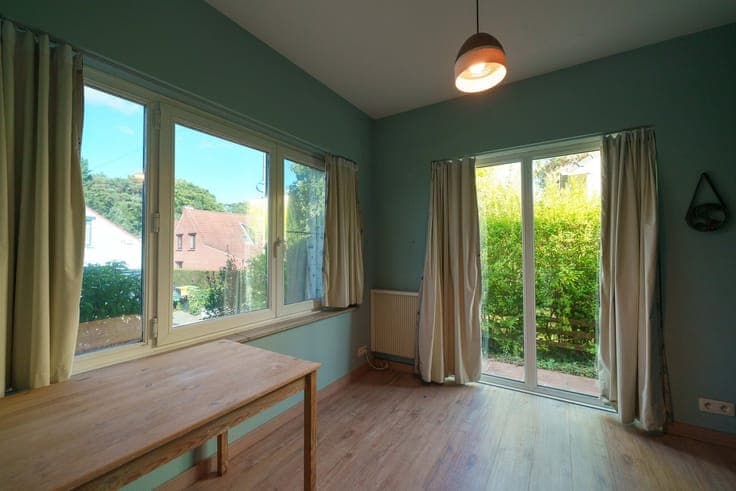 Spacious house with a south-facing yard in need of some upda