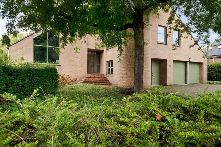 Vrijstaande architectenwoning met 5 slpk., atelier en dub...